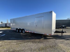 Continental Cargo V-Nose 28' Triple 7K Axles 12" Extra Height.